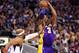 DALLAS, TX - FEBRUARY 24: Kobe Bryant #24 of the Los Angeles Lakers takes a shot against Vince Carter #25 of the Dallas Mavericks at American Airlines Center on February 24, 2013 in Dallas, Texas. NOTE TO USER: User expressly acknowledges and agrees that, by downloading and or using this photograph, User is consenting to the terms and conditions of the Getty Images License Agreement. (Photo by Ronald Martinez/Getty Images)