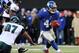 EAST RUTHERFORD, NJ - DECEMBER 30: Ahmad Bradshaw #44 of the New York Giants carries the ball and avoids Cullen Jenkins #97 of the Philadelphia Eagles at MetLife Stadium on December 30, 2012 in East Rutherford, New Jersey. The New York Giants defeated the Philadelphia Eagles 42-7. (Photo by Elsa/Getty Images)