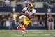 The Washington Redskins and cornerback DeAngelo Hall agree to a one-year contract and a reduction in pay for the 2013 season after testing free agency.