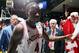 Mar 24, 2013; Dayton, OH, USA; Indiana Hoosiers guard Victor Oladipo (4) high fives a fan as he leaves the court after the win over the Temple Owls during the third round of the 2013 NCAA tournament at University of Dayton Arena. Mandatory Credit: Brian Spurlock-USA TODAY Sports