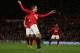 MANCHESTER, ENGLAND - DECEMBER 29: Robin van Persie of Manchester United watches the ball as he scores his team's second goal during the Barclays Premier League match between Manchester United and West Bromwich Albion at Old Trafford on December 29, 2012 in Manchester, England. (Photo by Clive Brunskill/Getty Images)