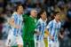 MALAGA, SPAIN - MARCH 13: (L-R) Ignacio Camacho, goalkeeper Willy Caballero, Martin Demichelis and Lucas Piazon of Malaga CF celebrate at the end of the UEFA Champions League Round of 16 second leg match between Malaga CF and FC Porto at La Rosaleda Stadium on March 13, 2013 in Malaga, Spain. (Photo by Jasper Juinen/Getty Images)