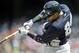 March 29, 2013; Washington, DC, USA; New York Yankees second baseman Robinson Cano (24) doubles in the first inning against the Washington Nationals at Nationals Park. Mandatory Credit: Joy R. Absalon-USA TODAY Sports