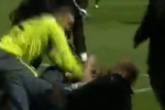 Video: Turkish Keeper Wails on Crazed Pitch Invader