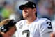 CHARLOTTE, NC - DECEMBER 23: Carson Palmer #3 of the Oakland Raiders watches from the sidelines during the second half after being injured during a game against the Carolina Panthers at Bank of America Stadium on December 23, 2012 in Charlotte, North Carolina. Carolina defeated Oakland 17-6. (Photo by Grant Halverson/Getty Images)