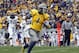MORGANTOWN, WV - NOVEMBER 03: Tavon Austin #1 of the West Virginia Mountaineers catches a forty three yard touchdown pass against the TCU Horned Frogs during the game on November 3, 2012 at Mountaineer Field in Morgantown, West Virginia. (Photo by Justin K. Aller/Getty Images)
