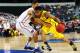 ARLINGTON, TX - MARCH 31: Trey Burke #3 of the Michigan Wolverines drives against Scottie Wilbekin #5 of the Florida Gators in the first half during the South Regional Round Final of the 2013 NCAA Men's Basketball Tournament at Dallas Cowboys Stadium on March 31, 2013 in Arlington, Texas. (Photo by Ronald Martinez/Getty Images)
