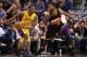 PHOENIX, AZ - MARCH 18: Metta World Peace #15 of the Los Angeles Lakers looks to pass around Markieff Morris #11 of the Phoenix Suns during the NBA game at US Airways Center on March 18, 2013 in Phoenix, Arizona. The Suns defeated the Lakers 99-76. NOTE TO USER: User expressly acknowledges and agrees that, by downloading and or using this photograph, User is consenting to the terms and conditions of the Getty Images License Agreement. (Photo by Christian Petersen/Getty Images)