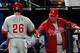 ATLANTA, GA - APRIL 01: Charlie Manuel #41 of the Philadelphia Phillies congratulates Chase Utley #26 on his solo homer in the fourth inning against the Atlanta Braves during Opening Day at Turner Field on April 1, 2013 in Atlanta, Georgia. (Photo by Kevin C. Cox/Getty Images)