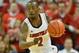 Dec 29, 2012; Louisville, KY, USA; Louisville Cardinals guard Russ Smith (2) dribbles against the Kentucky Wildcats during the second half at the KFC Yum! Center. Louisville defeated Kentucky 80-77. Mandatory Credit: Jamie Rhodes-USA TODAY Sports