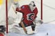 CALGARY, CANADA - MARCH 13: Miikka Kiprusoff #34 of the Calgary Flames makes a save against the Detroit Red Wings during third period NHL action on March 13, 2013 at the Scotiabank Saddledome in Calgary, Alberta, Canada. Calgary Flames defeated the Detroit Red Wings 5 - 2. (Photo by Mike Ridewood/Getty Images)