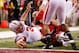 INDIANAPOLIS, IN - DECEMBER 01: Taylor Martinez #3 of the Nebraska Cornhuskers stretches for a third quarter touchdown during the Big 10 Conference Championship Game at Lucas Oil Stadium on December 1, 2012 in Indianapolis, Indiana. Wisconsin won the game 70-31. (Photo by Gregory Shamus/Getty Images)