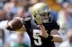 Apr. 21, 2012; South Bend, IN, USA; Notre Dame Fighting Irish quarterback Gunner Kiel (5) throws in the fourth quarter of the spring game at Notre Dame Stadium. Kiel wore the number five jersey in honor of his uncle and former Notre Dame quarterback Blair Kiel who died on April 8, 2012. Mandatory Credit: Matt Cashore-USA TODAY Sports