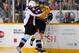 NASHVILLE, TN - APRIL 02: Ryan O'Byrne #3 of the Colorado Avalanche checks Patric Hornqvist #27 of the Nashville Predators at the Bridgestone Arena on April 2, 2013 in Nashville, Tennessee. (Photo by Frederick Breedon/Getty Images)