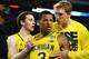 How many awards will Trey Burke take home at the end of the postseason?