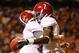KNOXVILLE, TN - OCTOBER 20: AJ McCarron #10 of the Alabama Crimson Tide celebrates after tossing a touchdown reception to Kenny Bell #7 against the Tennessee Volunteers at Neyland Stadium on October 20, 2012 in Knoxville, Tennessee. (Photo by Kevin C. Cox/Getty Images)