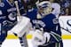 VANCOUVER, CANADA - MARCH 18: Goalie Roberto Luongo #1 of the Vancouver Canucks keeps an eye on the puck after making a save against the Minnesota Wild during the first period in NHL action on March 18, 2013 at Rogers Arena in Vancouver, British Columbia, Canada. (Photo by Rich Lam/Getty Images)