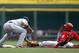 Aug 26, 2012; Cincinnati, OH, USA; Cincinnati Reds second baseman Brandon Phillips (4) is tagged out by St. Louis Cardinals shortstop Rafael Furcal (15) during the first inning at Great American Ball Park. Mandatory Credit: Frank Victores-USA TODAY Sports