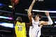 ARLINGTON, TX - MARCH 29: Tim Hardaway Jr. #10 of the Michigan Wolverines goes up against Jeff Withey #5 of the Kansas Jayhawks in the second half during the South Regional Semifinal round of the 2013 NCAA Men's Basketball Tournament at Dallas Cowboys Stadium on March 29, 2013 in Arlington, Texas. (Photo by Tom Pennington/Getty Images)