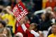 ATLANTA, GA - APRIL 05: A young fan of the Louisville Cardinals holds up a sign, which reads 'Win for #5 Ware' in reference to injured Louisville guard Kevin Ware who suffered a compound fracture of his leg in the Midwest regional Championship game, during practice prior to the NCAA Men's Final Four at the Georgia Dome on April 5, 2013 in Atlanta, Georgia. (Photo by Kevin C. Cox/Getty Images)