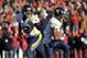 Nov 23, 2012; Ames, Iowa, USA; West Virginia Mountaineers quarterback Geno Smith (12) hands the ball off to running back Tavon Austin (1) against the Iowa State Cyclones during the first half at Jack Trice Stadium. Mandatory Credit: Peter G. Aiken-USA TODAY Sports