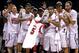 INDIANAPOLIS, IN - MARCH 31: (L-R starting from 2nd L) Chane Behanan #21 (holding #5 jersey of injured teammate Kevin Ware), Russ Smith #2, Peyton Siva #3, Wayne Blackshear #20 and Luke Hancock #11 of the Louisville Cardinals celebrate with the Midwest regional champion trophy after they won 85-63 against the Duke Blue Devils during the Midwest Regional Final round of the 2013 NCAA Men's Basketball Tournament at Lucas Oil Stadium on March 31, 2013 in Indianapolis, Indiana. Kevin Ware suffered a compound fracture of his leg in the first half. (Photo by Andy Lyons/Getty Images)