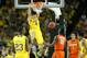 ATLANTA, GA - APRIL 06: Mitch McGary #4 of the Michigan Wolverines dunks against Rakeem Christmas #25 of the Syracuse Orange in the second half during the 2013 NCAA Men's Final Four Semifinal at the Georgia Dome on April 6, 2013 in Atlanta, Georgia. (Photo by Streeter Lecka/Getty Images)