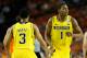 ATLANTA, GA - APRIL 06: (L-R) Trey Burke #3 and Glenn Robinson III #1 of the Michigan Wolverines react in the first half against the Syracuse Orange during the 2013 NCAA Men's Final Four Semifinal at the Georgia Dome on April 6, 2013 in Atlanta, Georgia. (Photo by Kevin C. Cox/Getty Images)