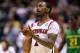 INDIANAPOLIS, IN - MARCH 29: Russ Smith #2 of the Louisville Cardinals reacts after they won 77-69 against the Oregon Ducks during the Midwest Region Semifinal round of the 2013 NCAA Men's Basketball Tournament at Lucas Oil Stadium on March 29, 2013 in Indianapolis, Indiana. (Photo by Andy Lyons/Getty Images)