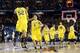 ATLANTA, GA - APRIL 06: (L-R) Jordan Morgan #52, Jon Horford #15 and Mitch McGary #4 of the Michigan Wolverines celerate on court after they won 61-56 against the Syracuse Orange during the 2013 NCAA Men's Final Four Semifinal at the Georgia Dome on April 6, 2013 in Atlanta, Georgia. (Photo by Streeter Lecka/Getty Images)
