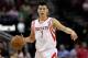 Apr 1, 2013; Houston, TX, USA; Houston Rockets point guard Jeremy Lin (7) brings the ball up the court during the third quarter against the Orlando Magic at Toyota Center. Mandatory Credit: Troy Taormina-USA TODAY Sports