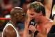 LAS VEGAS - AUGUST 24: Boxer Floyd Mayweather Jr. (L) stares down wrestler Chris Jericho during the WWE Monday Night Raw show at the Thomas & Mack Center August 24, 2009 in Las Vegas, Nevada. Mayweather was a special guest host during the broadcast. (Photo by Ethan Miller/Getty Images)