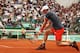 PARIS, FRANCE - JUNE 06: Andy Murray of Great Britain plays a backhand during his men's singles quarter final match against David Ferrer of Spain during day 11 of the French Open at Roland Garros on June 6, 2012 in Paris, France. (Photo by Matthew Stockman/Getty Images)