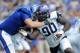 Sep 15, 2012; Lawrence, KS, USA; Texas Christian Horned Frogs defensive end Stansly Maponga (90) rushes against Kansas Jayhawks offensive lineman Gavin Howard (70) in the second half at Memorial Stadium. TCU won the game 20-6. Mandatory Credit: John Rieger-USA TODAY Sports