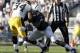 STATE COLLEGE, PA - OCTOBER 8: Gerald Hodges #6 of the Penn State Nittany Lions tackles Marcus Coker #34 of the Iowa Hawkeyes during the game on October 8, 2011 at Beaver Stadium in State College, Pennsylvania. (Photo by Justin K. Aller/Getty Images)