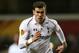 LONDON, ENGLAND - APRIL 04: Gareth Bale of Tottenham Hotspur runs with the ball during the UEFA Europa League quarter-final first leg between Tottenham Hotspur FC and FC Basel 1893 at White Hart Lane on April 4, 2013 in London, England. (Photo by Paul Gilham/Getty Images)