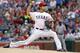 ARLINGTON, TX - APRIL 7: Yu Darvish #11 of the Texas Rangers throws a pitch in the first inning against the Los Angeles Angels of Anaheim at Rangers Ballpark in Arlington on April 7, 2013 in Arlington, Texas. (Photo by Brandon Wade/Getty Images)