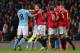 MANCHESTER, ENGLAND - APRIL 08: Gareth Barry of Manchester City clashes with Ryan Giggs of Manchester United during the Barclays Premier League match between Manchester United and Manchester City at Old Trafford on April 8, 2013 in Manchester, England. (Photo by Alex Livesey/Getty Images)