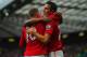 MANCHESTER, ENGLAND - OCTOBER 20: Wayne Rooney of Manchester United celebrates scoring to make it 1-1 with Robin van Persie during the Barclays Premier League match between Manchester United and Stoke City at Old Trafford on October 20, 2012 in Manchester, England. (Photo by Michael Regan/Getty Images)