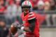 COLUMBUS, OH - NOVEMBER 24: Quarterback Braxton Miller #5 of the Ohio State Buckeyes controls the ball against the Michigan Wolverines at Ohio Stadium on November 24, 2012 in Columbus, Ohio. (Photo by Jamie Sabau/Getty Images)