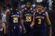 LOS ANGELES, CA - MARCH 28: Tyrone Garland #21, Ramon Galloway #55 and Tyreek Duren #3 of the La Salle Explorers talk on the court in the first half while taking on the Wichita State Shockers during the West Regional of the 2013 NCAA Men's Basketball Tournament at Staples Center on March 28, 2013 in Los Angeles, California. (Photo by Harry How/Getty Images)