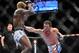 Dec 29, 2012; Las Vegas, NV, USA; Jamie Varner (right) strikes Melvin Guillard (left) during UFC 155 at the MGM Grand Garden Arena. Mandatory Credit: Gary A. Vasquez-USA TODAY Sports