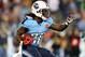 NASHVILLE, TN - DECEMBER 17: Running back Chris Johnson #28 of the Tennessee Titans runs with the ball against the New York Jets at LP Field on December 17, 2012 in Nashville, Tennessee. (Photo by Andy Lyons/Getty Images)