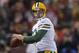 Jan 12, 2013; San Francisco, CA, USA; Green Bay Packers quarterback Aaron Rodgers (12) throws a pass against the San Francisco 49ers in the NFC divisional round playoff game at Candlestick Park. Mandatory Credit: Kirby Lee-USA TODAY Sports