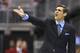 KANSAS CITY, MO - MARCH 22: Jay Wright head coach of the Villanova Wildcats yells at an official during a game against the North Carolina Tar Heels in the second round of the 2013 NCAA Men's Basketball Tournament at the Sprint Center on March 22, 2013 in Kansas City, Missouri. (Photo by Ed Zurga/Getty Images)
