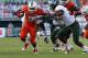 MIAMI GARDENS, FL - NOVEMBER 17: Sam Barrington #36 of the South Florida Bulls attempts to tackle Duke Johnson #8 of the Miami Hurricanes as he runs with the ball on November 17, 2012 at Sun Life Stadium in Miami Gardens, Florida. The Hurricanes defeated the Bulls 40-9. (Photo by Joel Auerbach/Getty Images)