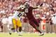Oct 20, 2012; College Station, TX, USA; Texas A&M Aggies linebacker Sean Porter (10) runs past LSU Tigers running back Spencer Ware (11) during the first half at Kyle Field. Mandatory Credit: Thomas Campbell