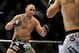 Apr 21, 2012; Atlanta, GA, USA; Travis Browne (left) fights Chad Griggs in a heavyweight bout during UFC 145 at Philips Arena. Travis Browne won in the first round by submission. Mandatory Credit: Paul Abell-USA TODAY Sports