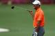 AUGUSTA, GA - APRIL 08: Tiger Woods of the United States gestures during a practice round prior to the start of the 2013 Masters Tournament at Augusta National Golf Club on April 8, 2013 in Augusta, Georgia. (Photo by Mike Ehrmann/Getty Images)
