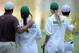 AUGUSTA, GA - APRIL 10: Rory McIlroy of Northern Ireland hugs his caddie Caroline Wozniacki as Graeme McDowell of Northern Ireland hugs his caddie and fiance Kristin Stape during the Par 3 Contest prior to the start of the 2013 Masters Tournament at Augusta National Golf Club on April 10, 2013 in Augusta, Georgia. (Photo by Harry How/Getty Images)